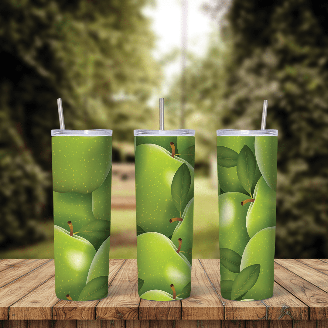An apple tumbler wrap covered with a close pile of shiny green apples and green leaves, in a realistic fruit pattern around. Sublimation design