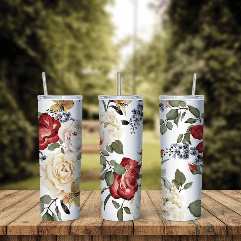 A full 20 oz skinny tumbler wrap with red and cream roses, small blue flowers and green leaves on white. Sublimation design