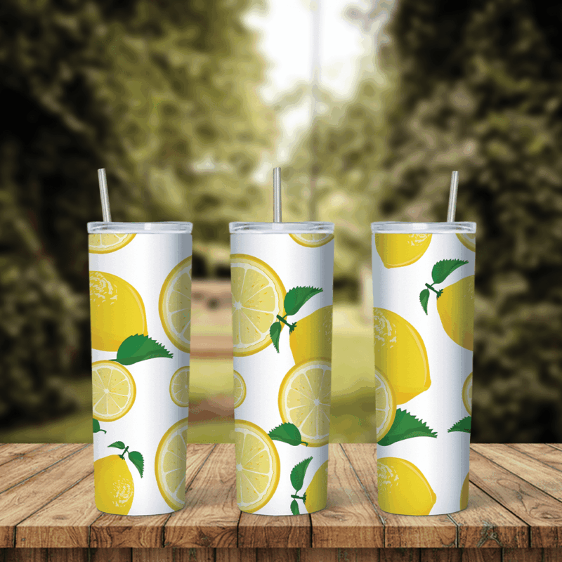 A full 20 oz skinny tumbler wrap with watercolor style whole lemons, lemon halves and green leaves on white. Sublimation design