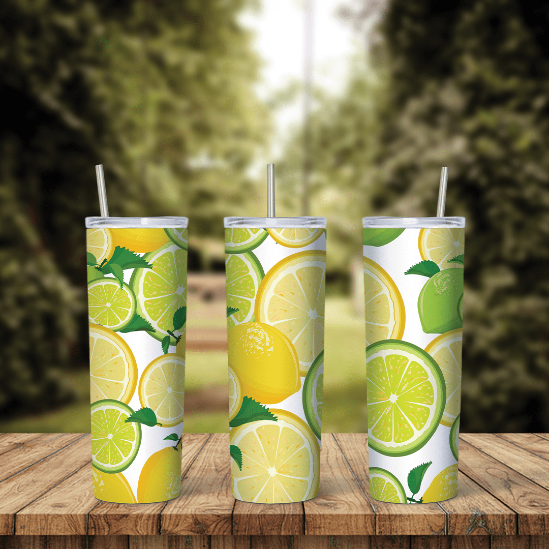 A full 20 oz skinny tumbler wrap with whole lemons, lemon and lime slices and green leaves on white. Sublimation design