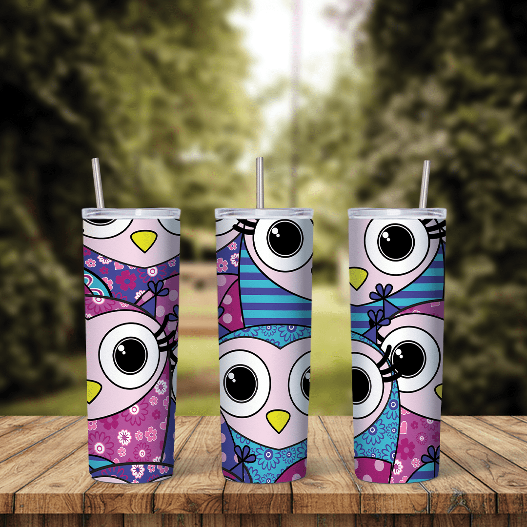 A 20 oz tumbler wrap with cartoon owls in pink, purple and blue patterns with big round eyes and small flower prints. Sublimation design