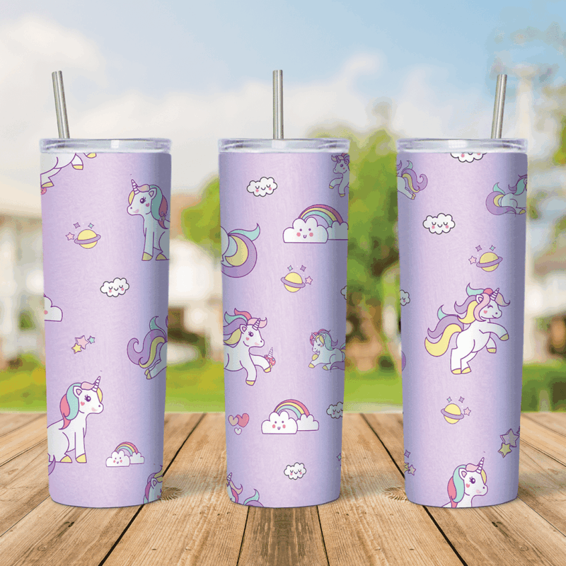 A 20 oz skinny tumbler wrap with a pastel lavender pattern of small cartoon unicorns, rainbows, clouds, cupcakes and stars. Sublimation design