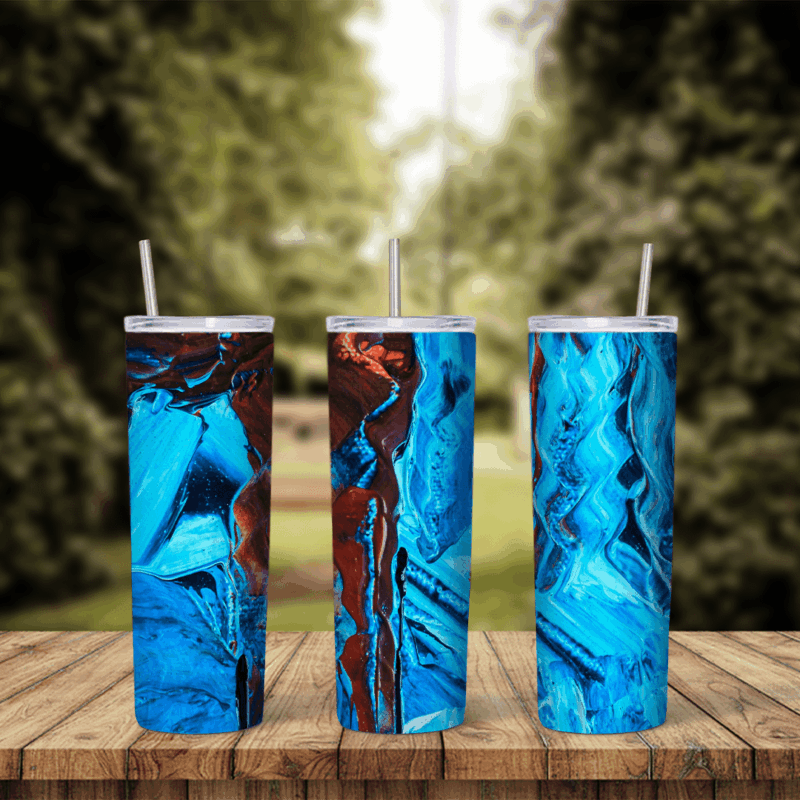 A full 20 oz skinny tumbler wrap with thick acrylic paint strokes in bright and deep blues with rusty brown streaks. Sublimation design