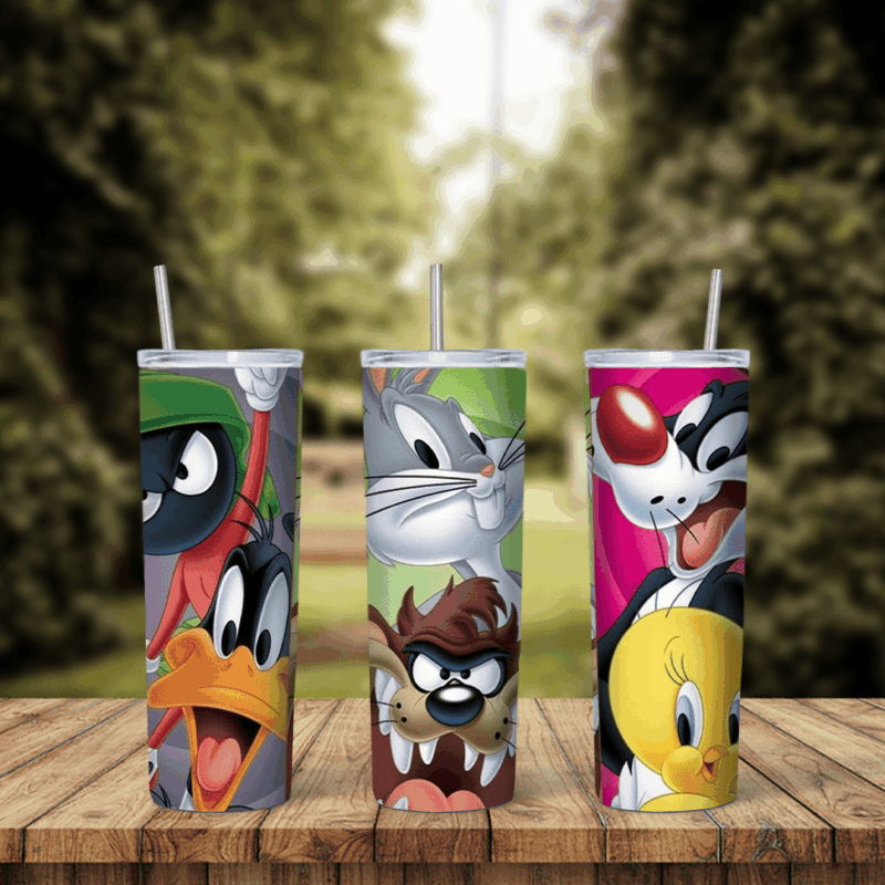 A full 20 oz skinny tumbler wrap of Looney Tunes faces: Bugs Bunny, Marvin the Martian, Daffy Duck, Taz, Sylvester and Tweety. Sublimation design
