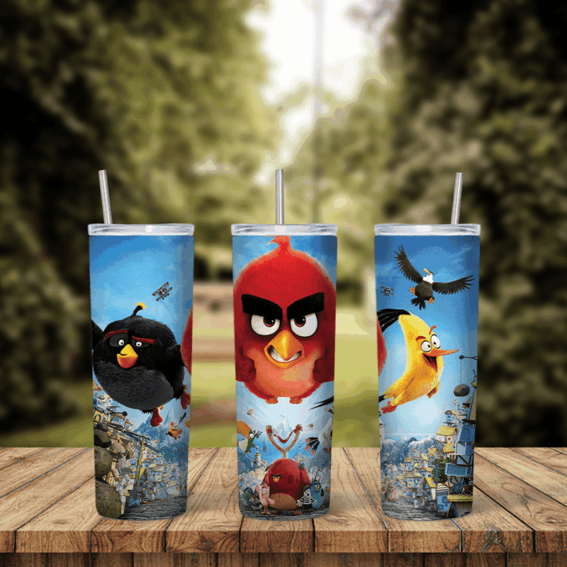 An Angry Birds tumbler wrap: Red, Bomb and Chuck from the movie in front of a colorful island town under a blue sky. Sublimation design