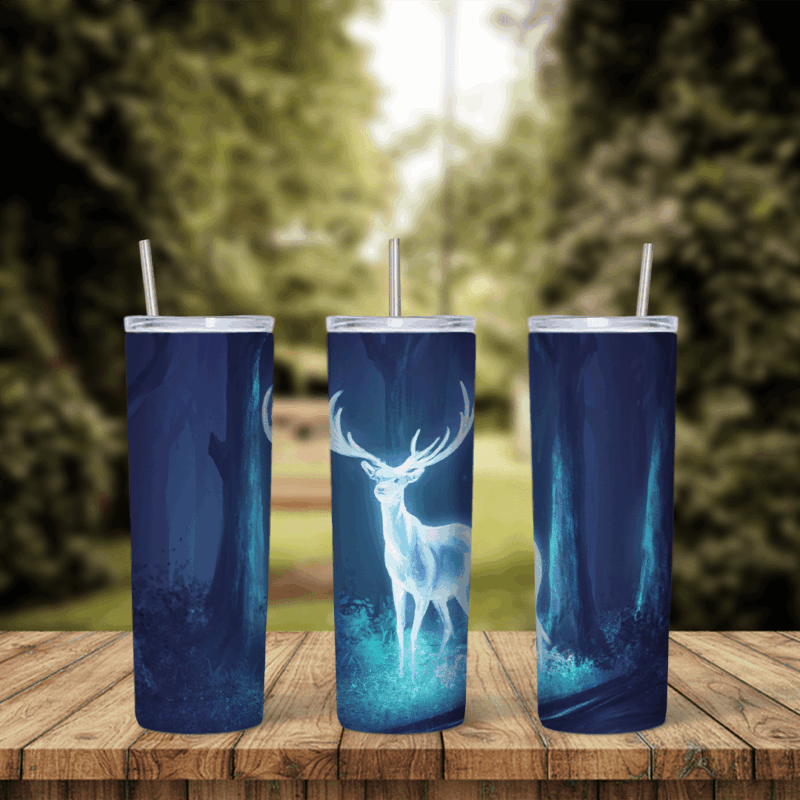 A full 20 oz skinny tumbler wrap with a glowing white stag with large antlers standing in a dark blue night forest. Sublimation design