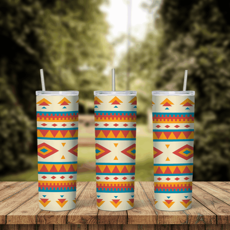 A full 20 oz skinny tumbler wrap with an Aztec style pattern of orange, red, yellow and teal triangles and diamonds in bands. Sublimation design