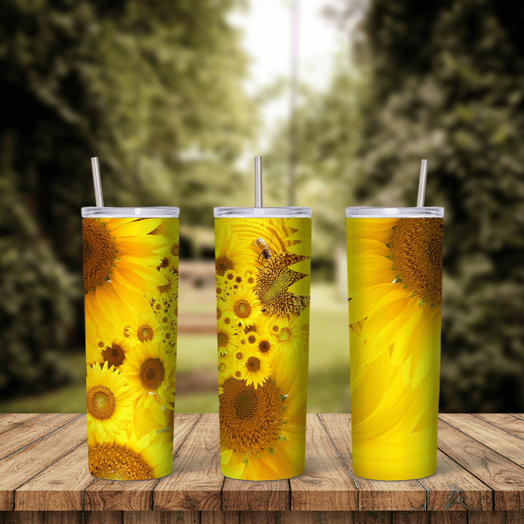 A sunflower tumbler wrap filled with large golden yellow sunflower heads and petals shown up close, in warm yellow and brown. Sublimation design