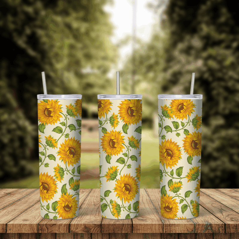 A sunflower tumbler wrap: yellow sunflowers with green leaves and curling vines scattered over a soft cream background. Sublimation design