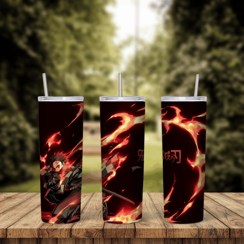 A Demon Slayer tumbler wrap with Tanjiro surrounded by swirling red and orange flames on a black background. Sublimation design