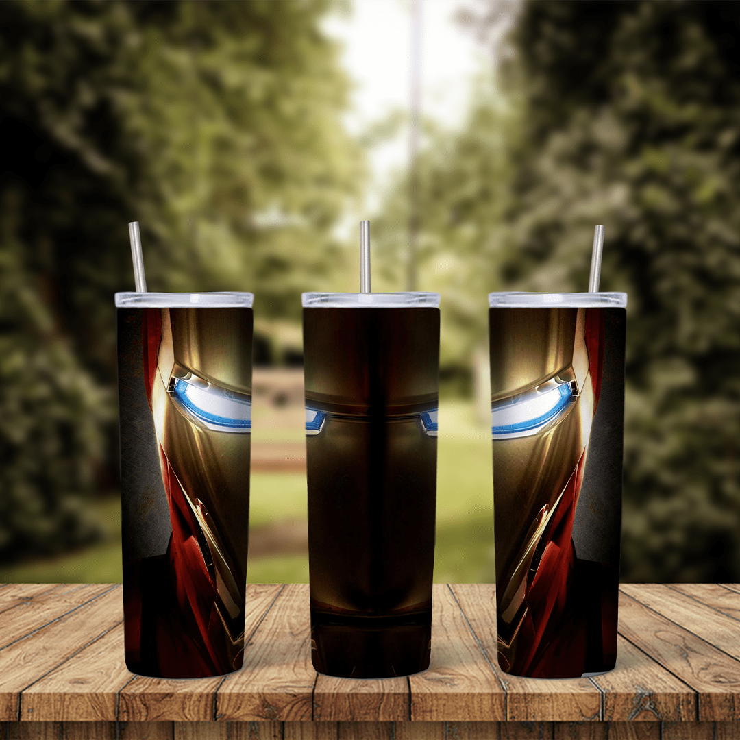 A 20 oz skinny tumbler wrap with an extreme close up of the red and gold Iron Man helmet and its glowing white eyes on a dark. Sublimation design