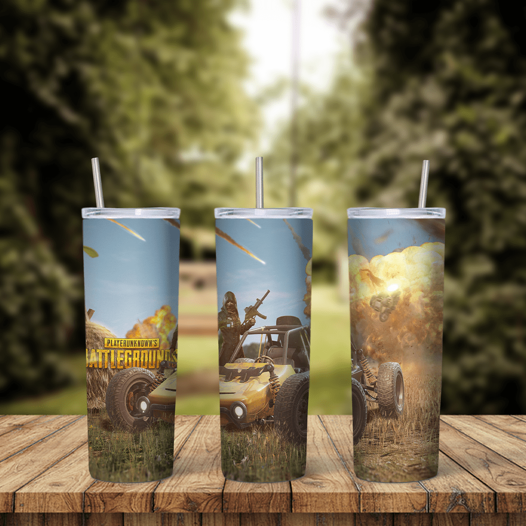 A full 20 oz skinny tumbler wrap with PUBG game art: the Battlegrounds logo, a buggy vehicle, an armed player and a dusty sky. Sublimation design