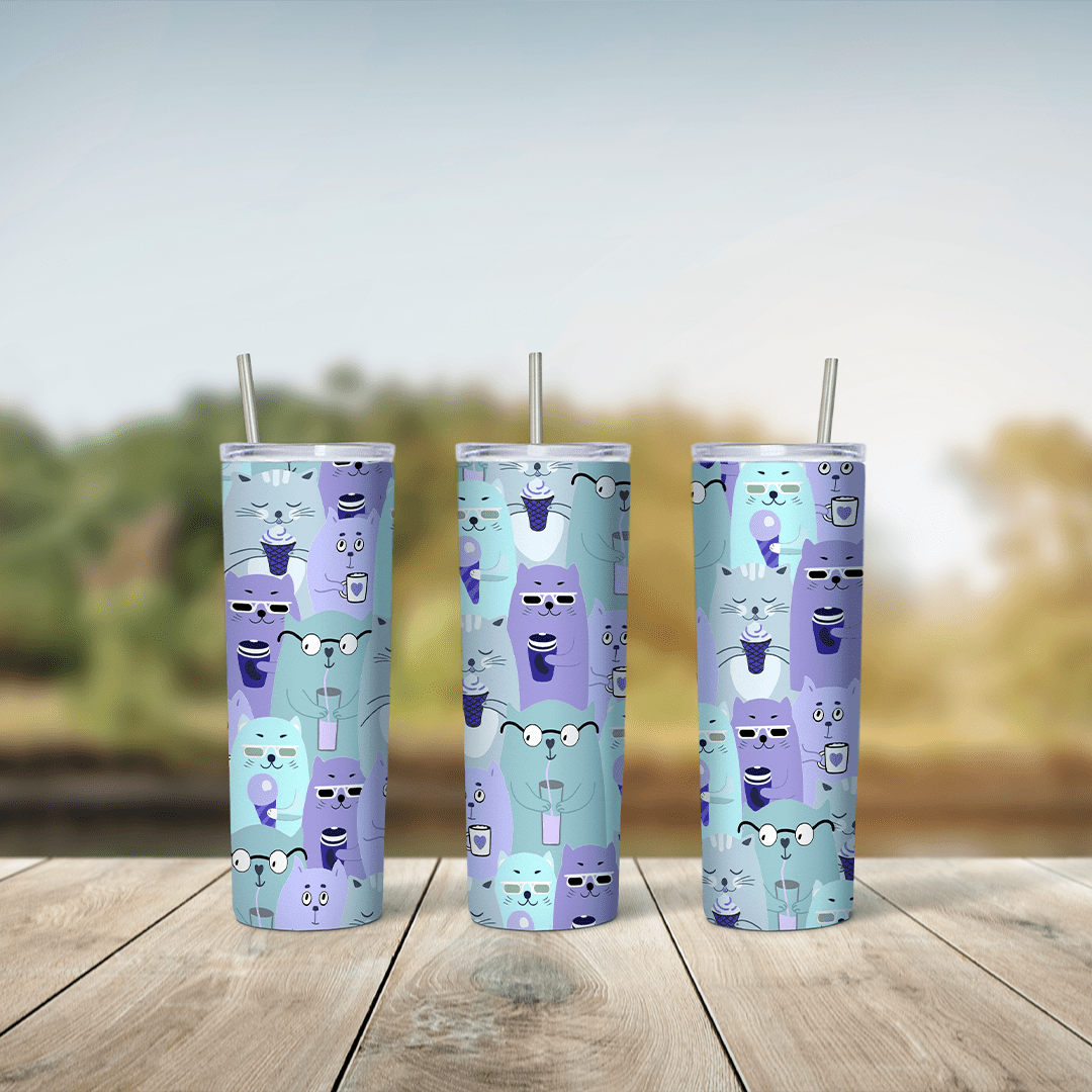 A mint and lilac 20 oz tumbler wrap with a repeating pattern of small stacked cartoon cats with tiny faces. Sublimation design