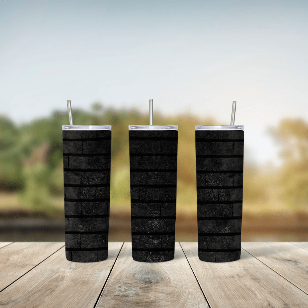 A full 20 oz skinny tumbler wrap with a black brick wall texture, with dark grey mortar lines and a worn, rough finish. Sublimation design