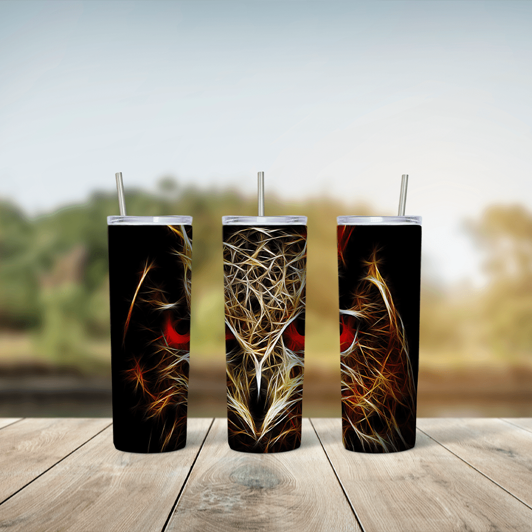 A black 20 oz tumbler wrap with an owl drawn in glowing orange and gold fractal light lines and piercing red eyes. Sublimation design
