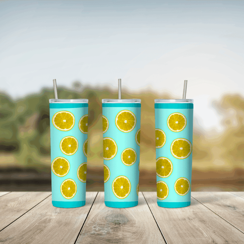 A full 20 oz skinny tumbler wrap with round yellow citrus slices scattered on a bright aqua background. Sublimation design