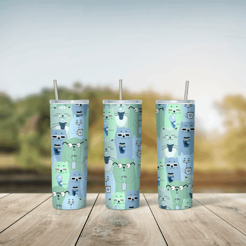 A green and blue 20 oz tumbler wrap with a repeating pattern of small stacked cartoon cats with tiny faces. Sublimation design