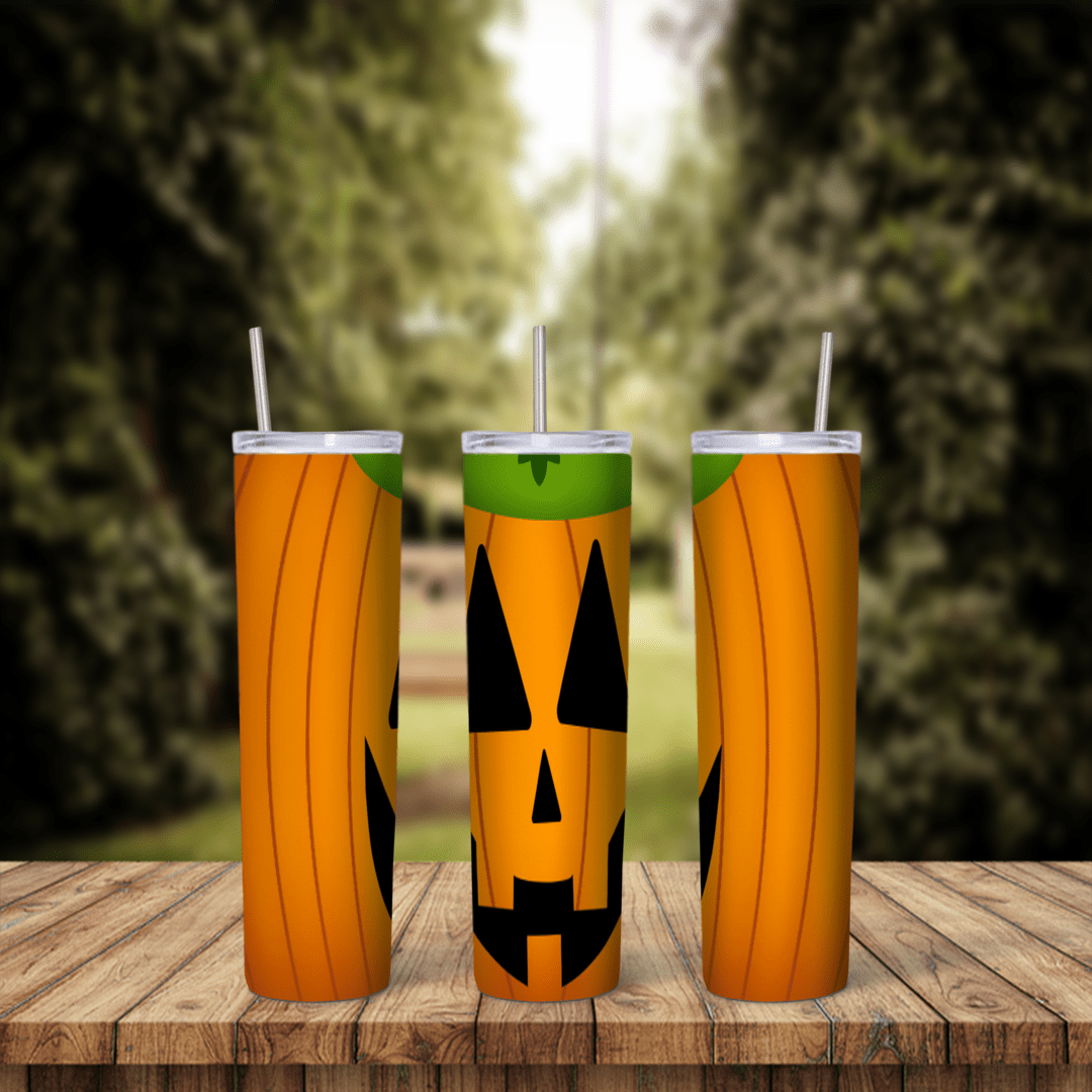 A full 20 oz skinny tumbler wrap styled as a pumpkin: orange ribbed skin, a green stem band at the top and a black carved jack o. Sublimation design
