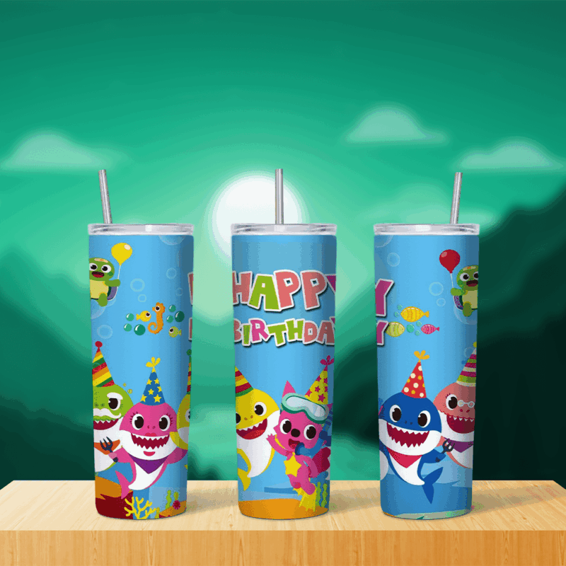 A blue 20 oz tumbler wrap with Happy Birthday lettering, the Baby Shark family and Pinkfong in party hats, balloons and small fish. Sublimation design