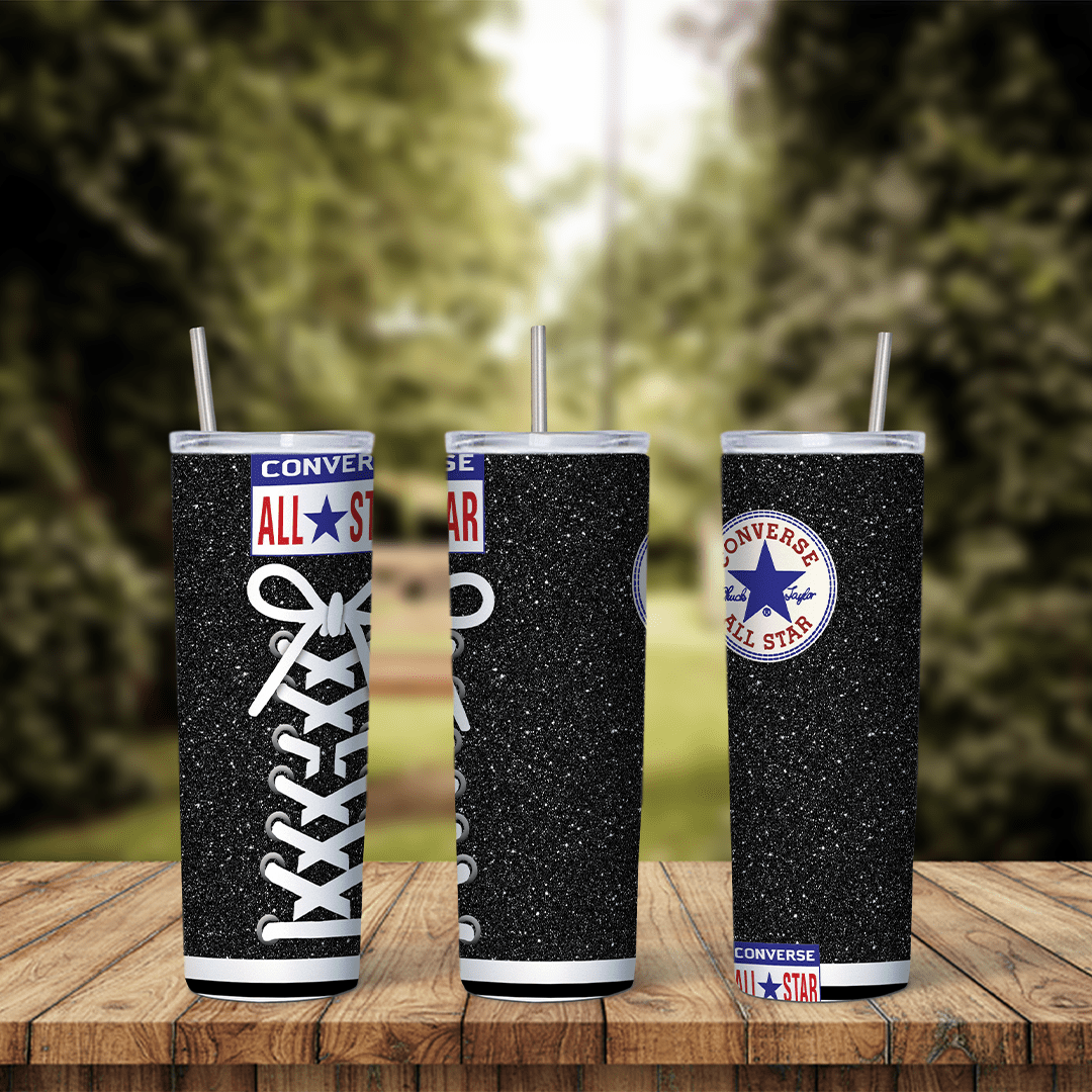 A full 20 oz skinny tumbler wrap styled as a black glitter Converse high top: white laces, the All Star tongue label. Sublimation design
