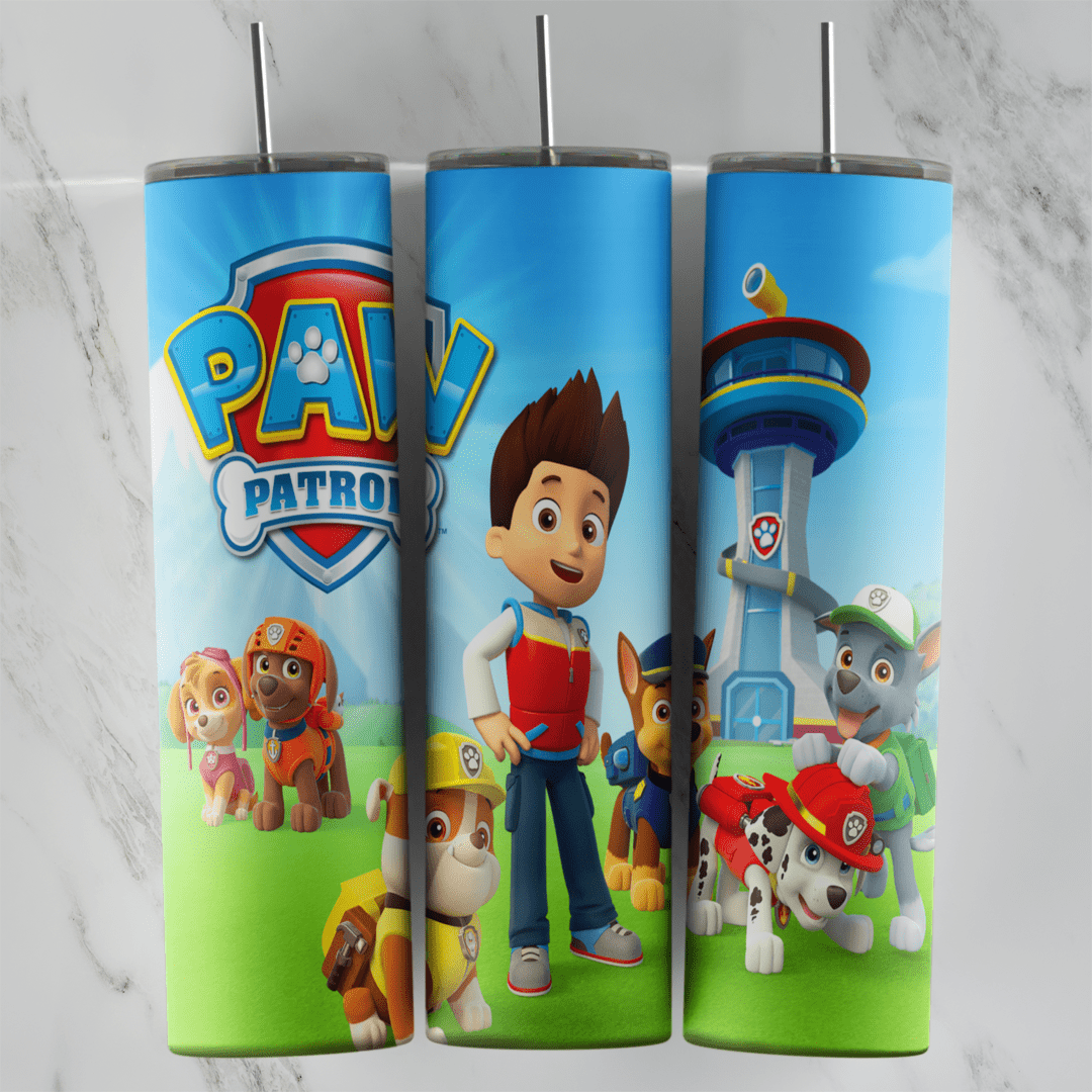 A 20 oz skinny tumbler wrap with the Paw Patrol logo, Ryder, the pups and the lookout tower on a blue sky and green grass. Sublimation design