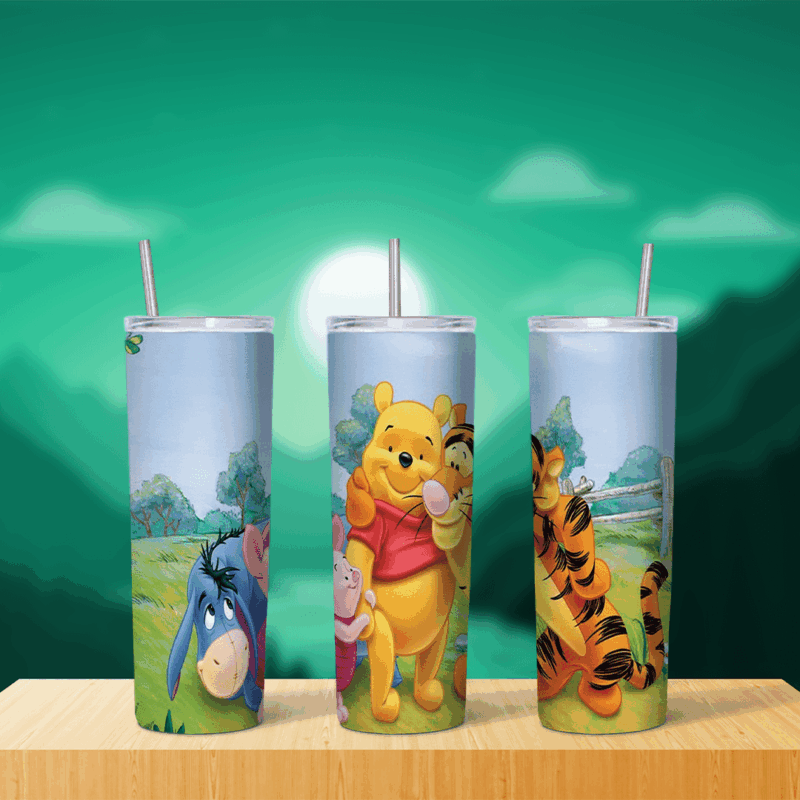 A 20 oz skinny tumbler wrap with Pooh hugging Tigger beside Piglet and Eeyore in a green meadow with trees, a fence and a pale. Sublimation design