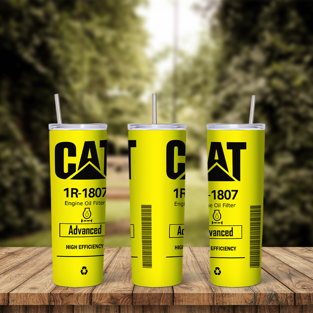 A yellow tumbler wrap styled as a CAT engine oil filter with the CAT logo, part number 1R-1807, Engine Oil Filter and Advanced. Sublimation design
