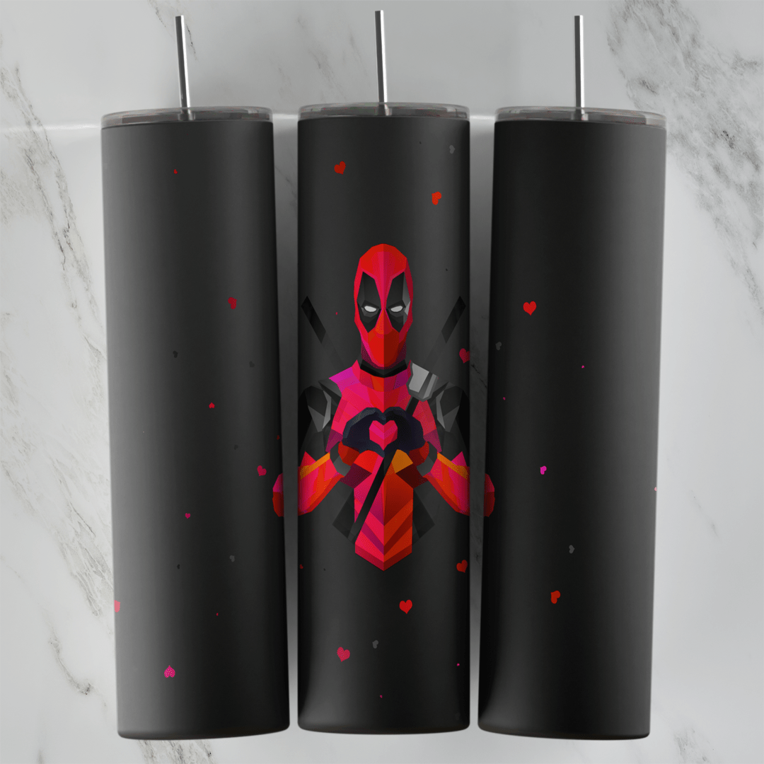 A matte black 20 oz tumbler wrap with a pink and red Deadpool forming a heart with his fingers and tiny red hearts across the cup. Sublimation design