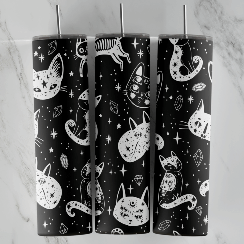 A black tumbler wrap covered in white line art cats: doodled cat faces and sleeping cats with stars, moons, crystals and sparkles. Sublimation design