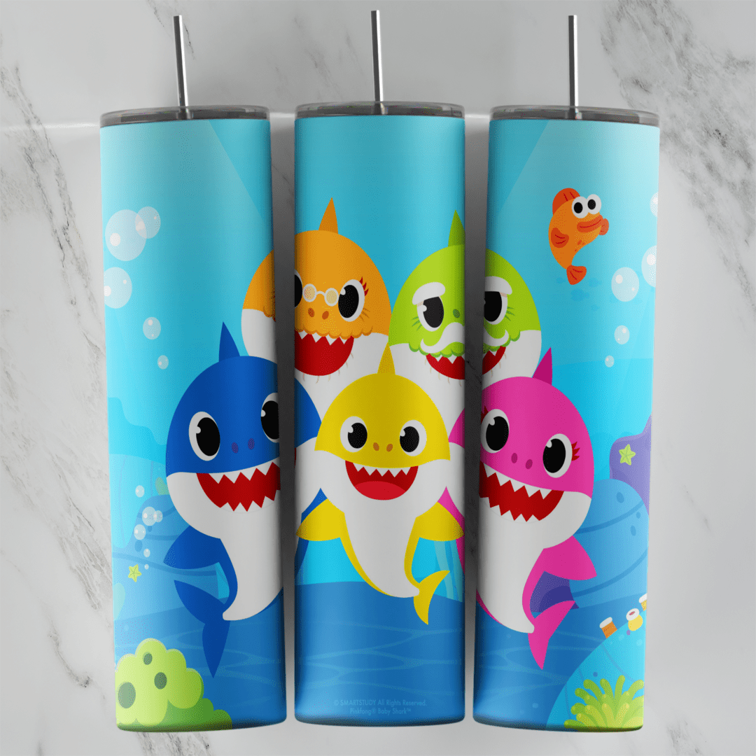 A blue 20 oz tumbler wrap with the Baby Shark family, blue, orange, yellow, green and pink sharks, swimming together. Sublimation design