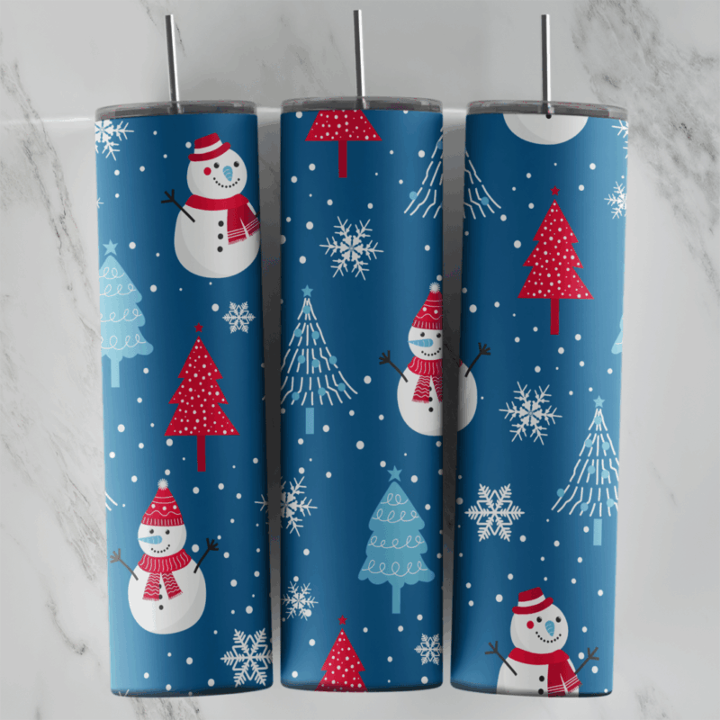 A full 20 oz skinny tumbler wrap on navy blue with snowmen, red and white Christmas trees and falling snowflakes. Sublimation design