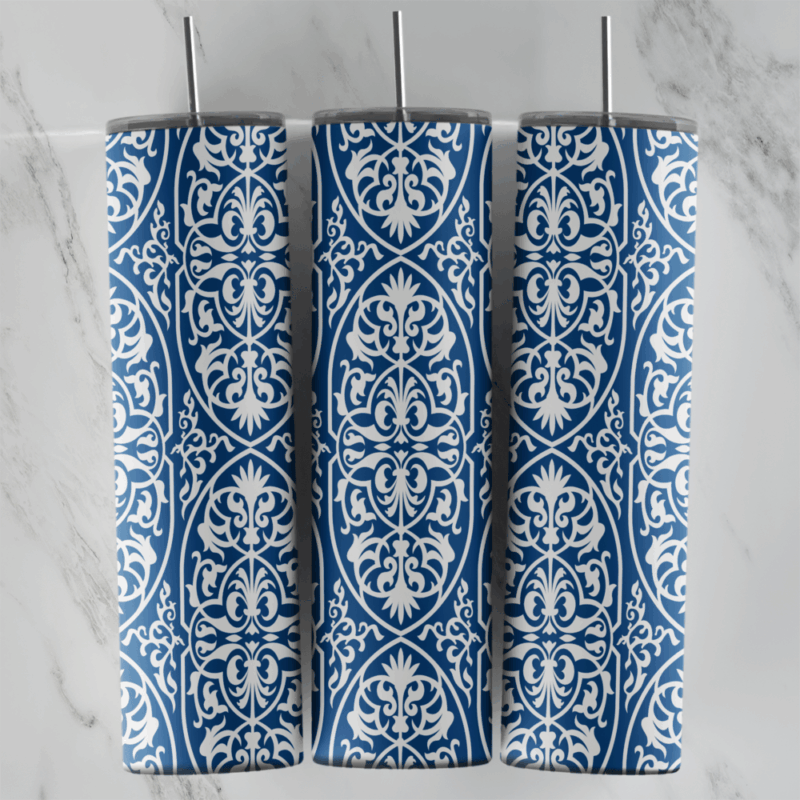 A 20 oz skinny tumbler wrap with a navy blue arabesque pattern: white filigree medallions and scrolls stacked in vertical rows. Sublimation design
