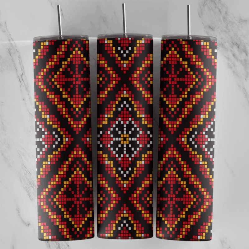 A 20 oz skinny tumbler wrap with a bold cross-stitch pattern of red, yellow and white diamonds and star motifs on a black. Sublimation design