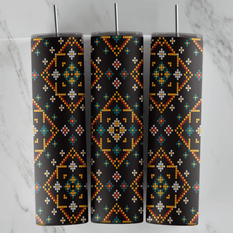 A 20 oz skinny tumbler wrap with a cross-stitch style ethnic pattern: orange, teal, red and white diamond motifs stitched. Sublimation design