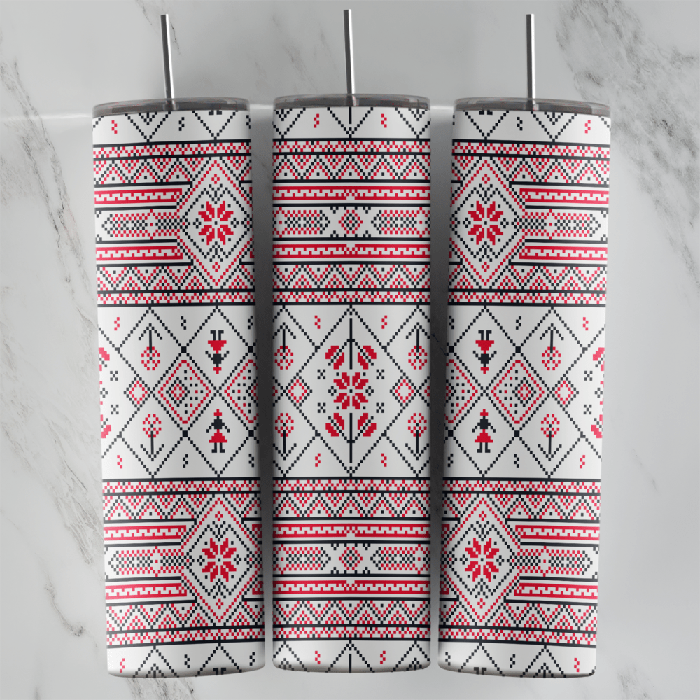 A 20 oz skinny tumbler wrap with a Slavic style folk cross-stitch pattern: red and black flower borders and diamond medallions. Sublimation design