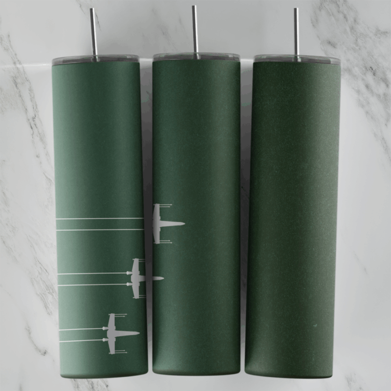 A full 20 oz skinny tumbler wrap in dark olive green with small white X-wing style starfighters flying in formation, trailed by. Sublimation design