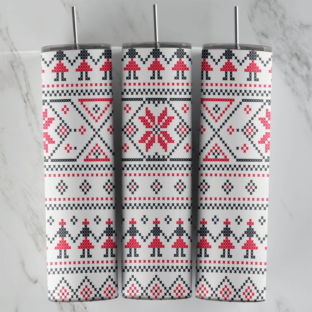 A 20 oz skinny tumbler wrap with a white folk pattern of red eight pointed stars, stitched people figures and black and red. Sublimation design