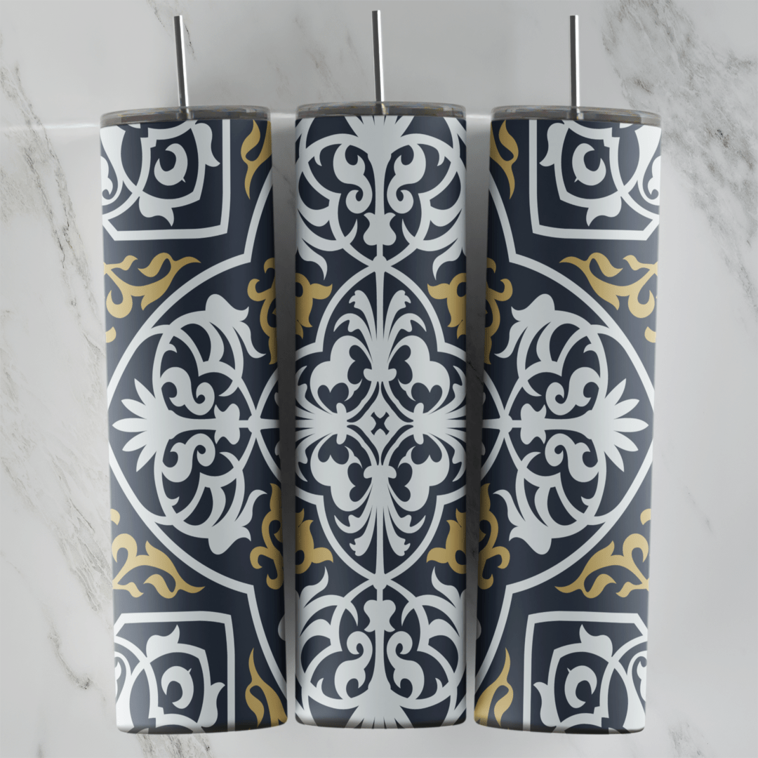 A 20 oz skinny tumbler wrap with a gray arabesque tile pattern: white medallions with ornamental leaves and gold scroll details. Sublimation design