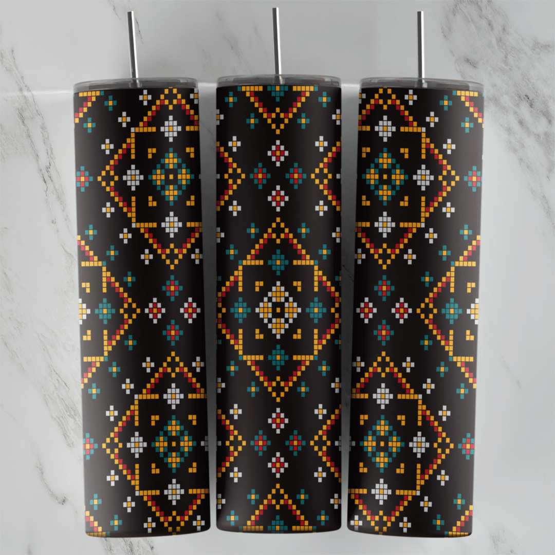 A 20 oz skinny tumbler wrap with a black cross-stitch pattern of orange diamond frames filled with teal, red, yellow and white. Sublimation design