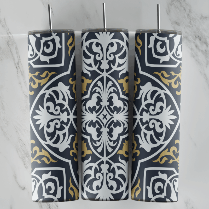 A 20 oz skinny tumbler wrap with a charcoal gray arabesque tile pattern: large white medallions and gold scroll accents. Sublimation design
