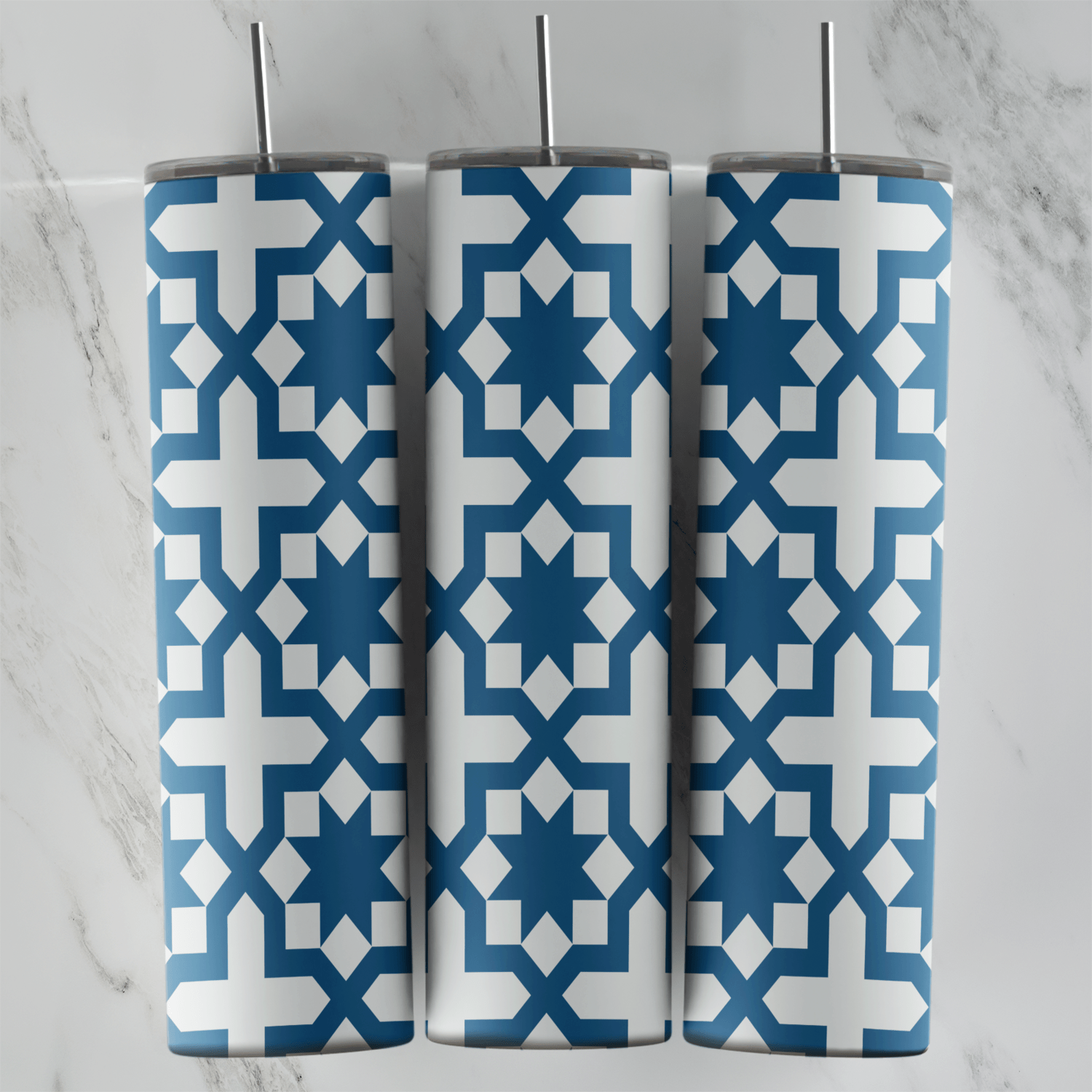 A 20 oz skinny tumbler wrap with a blue and white arabesque lattice: white star and cross shapes repeating across a blue. Sublimation design