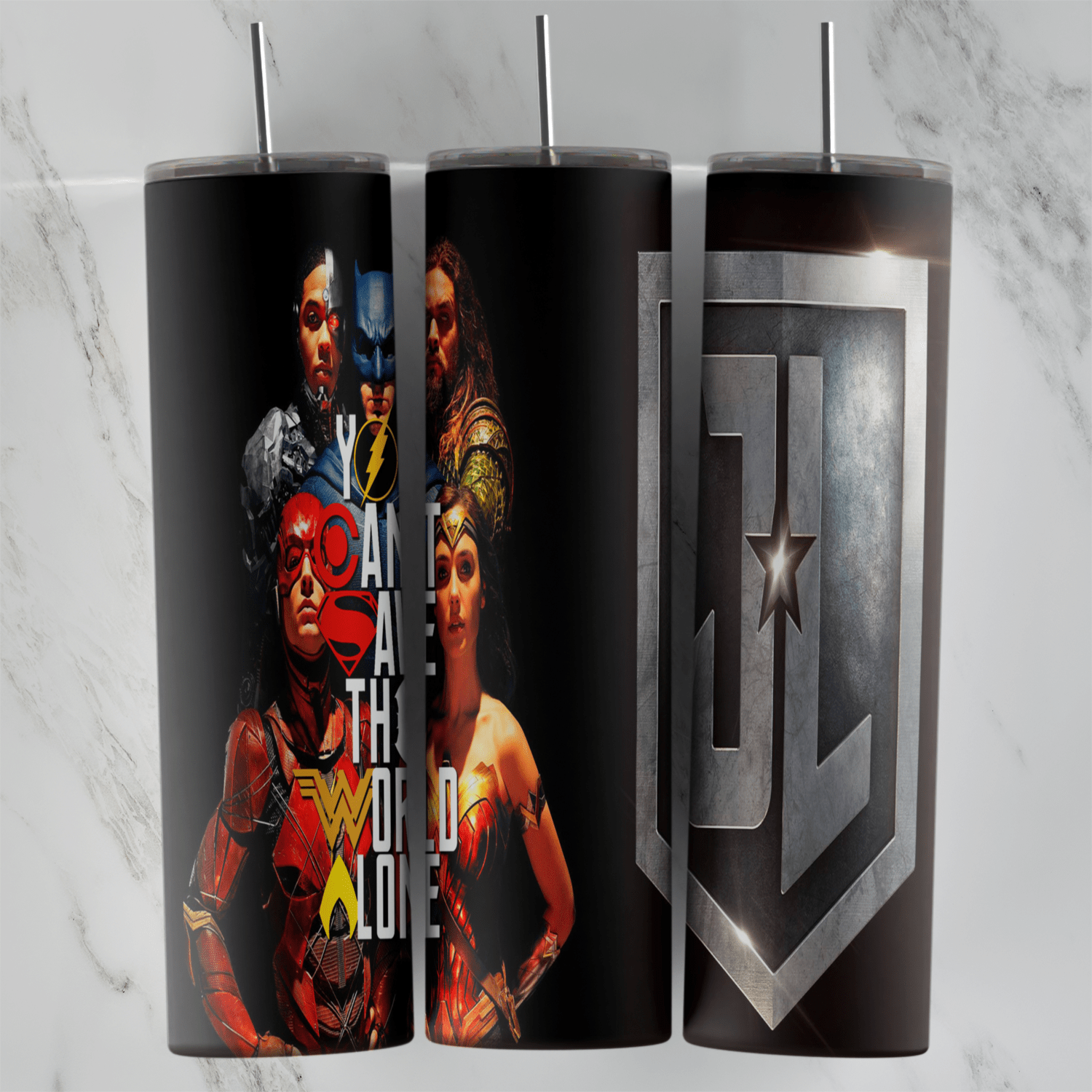 A 20 oz skinny tumbler wrap with a Justice League team poster, You Can’t Save the World Alone lettering and a large silver JL. Sublimation design