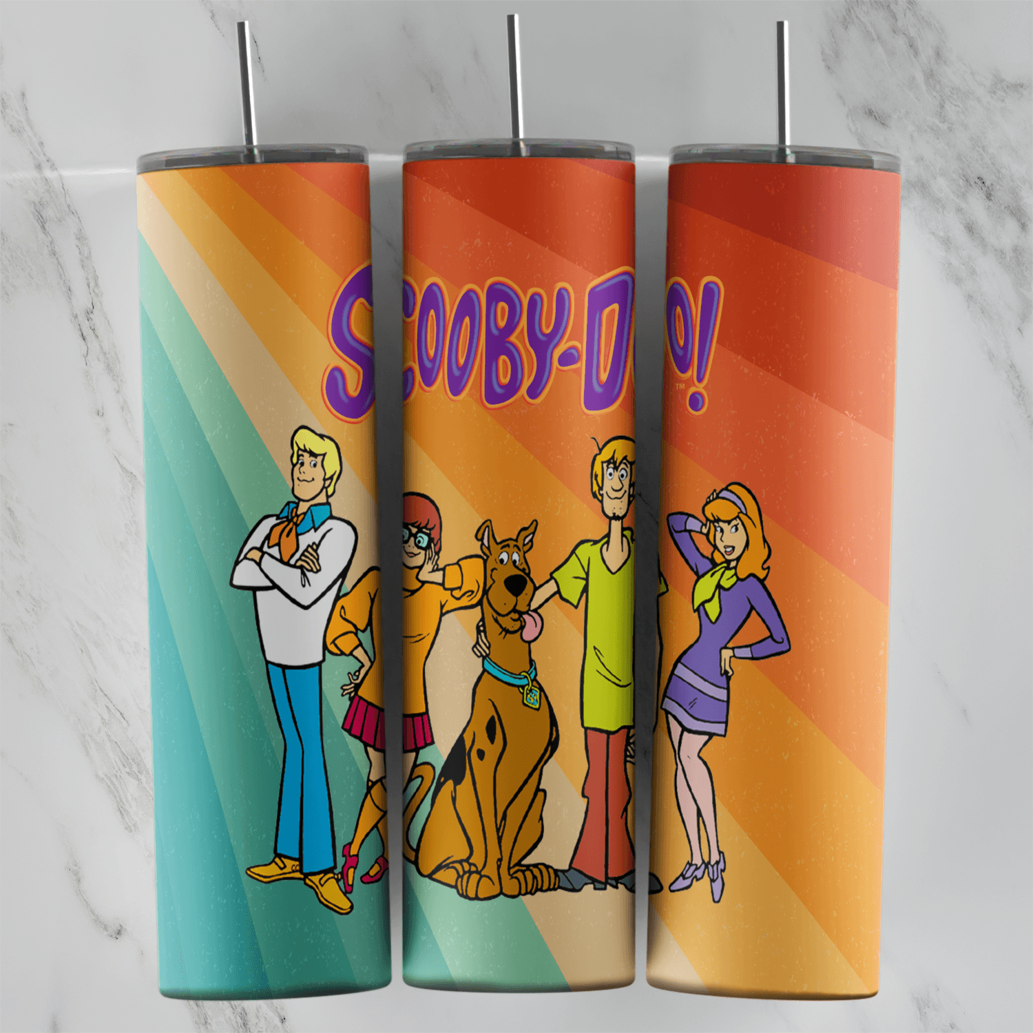 A 20 oz skinny tumbler wrap with Fred, Velma, Scooby-Doo, Shaggy and Daphne standing together under Scooby-Doo lettering on teal. Sublimation design