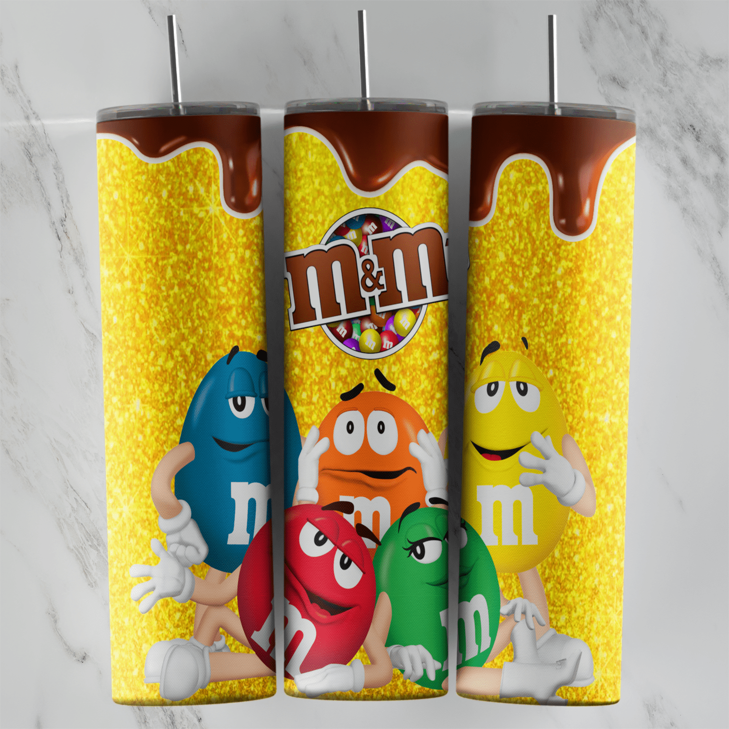 A yellow glitter M and M tumbler wrap with a chocolate drip border, the logo and the blue, orange, red, green and yellow. Sublimation design