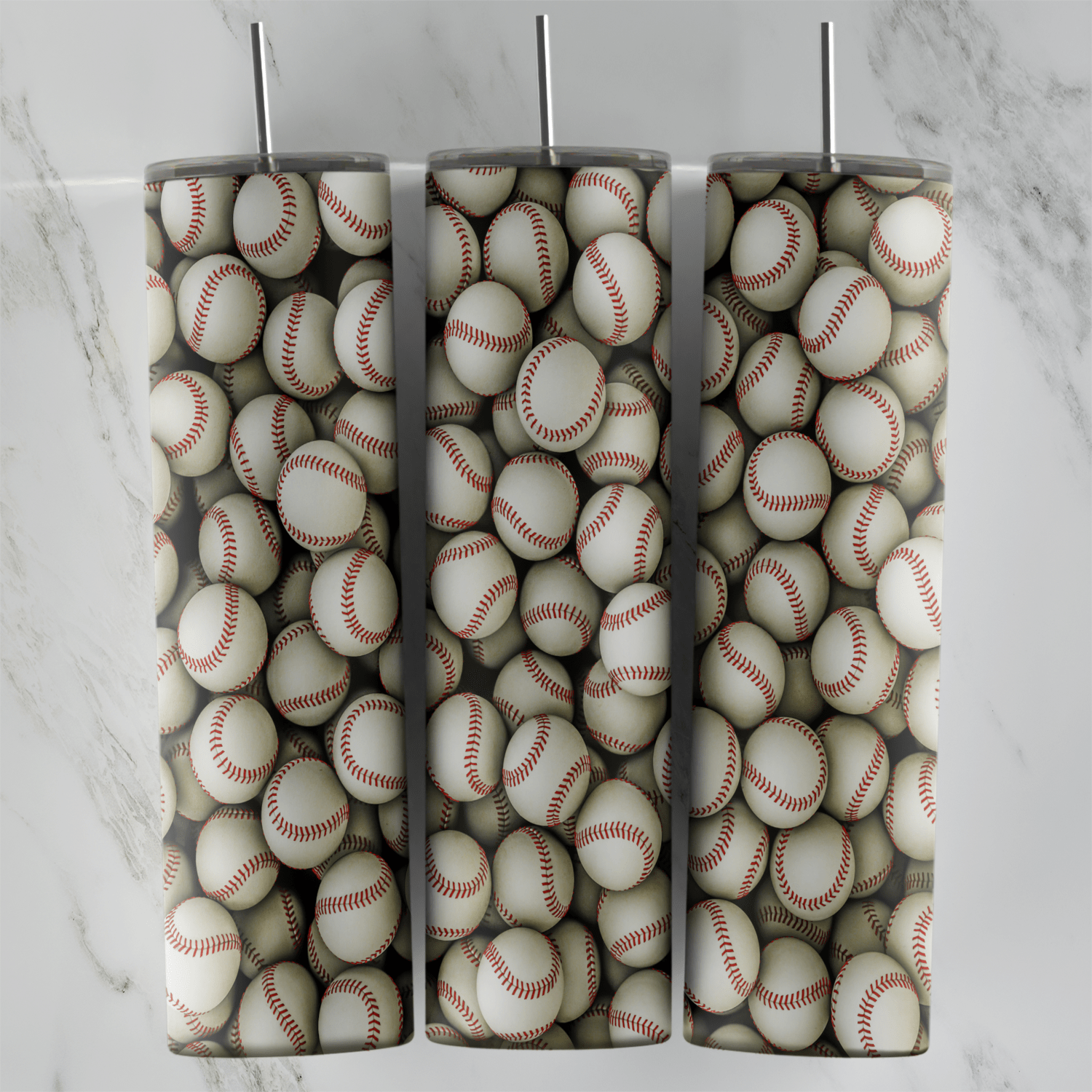 A 20 oz skinny tumbler wrap covered edge to edge with a pile of white baseballs with red stitching. Sublimation design