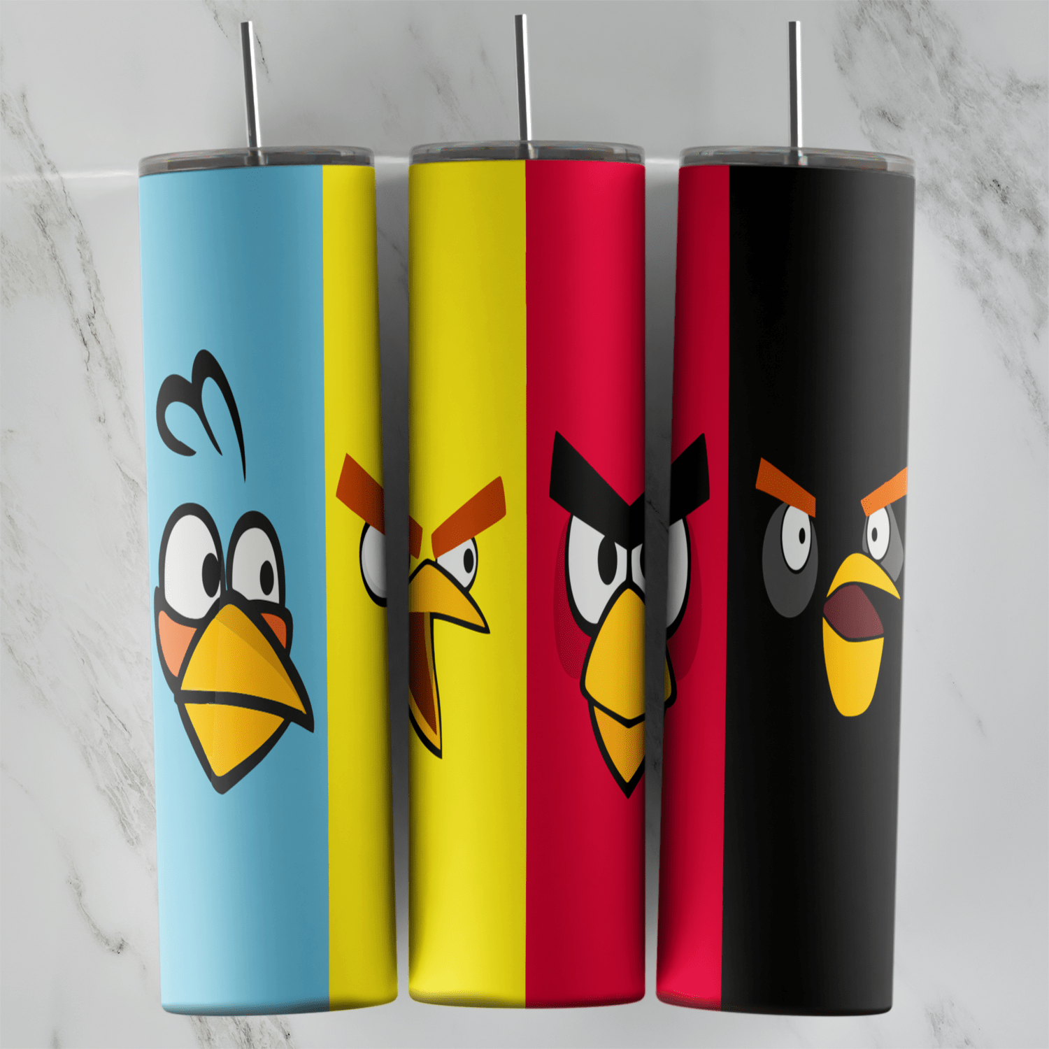 An Angry Birds tumbler wrap with color block stripes in blue, yellow, red and black, each showing a bird face with angry eyebrows. Sublimation design