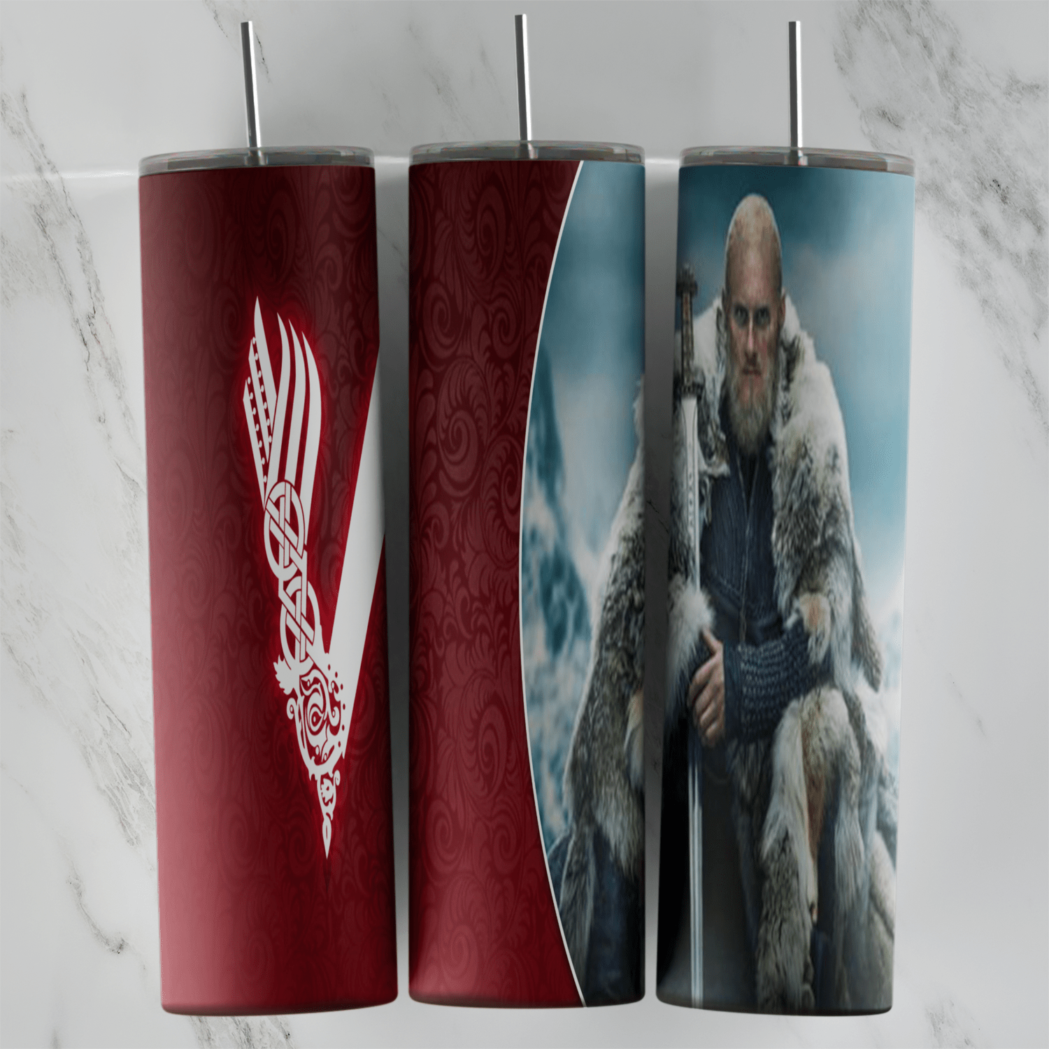 A 20 oz skinny tumbler wrap with the white Vikings V logo on dark red and a seated gray bearded warrior in a fur cloak against. Sublimation design