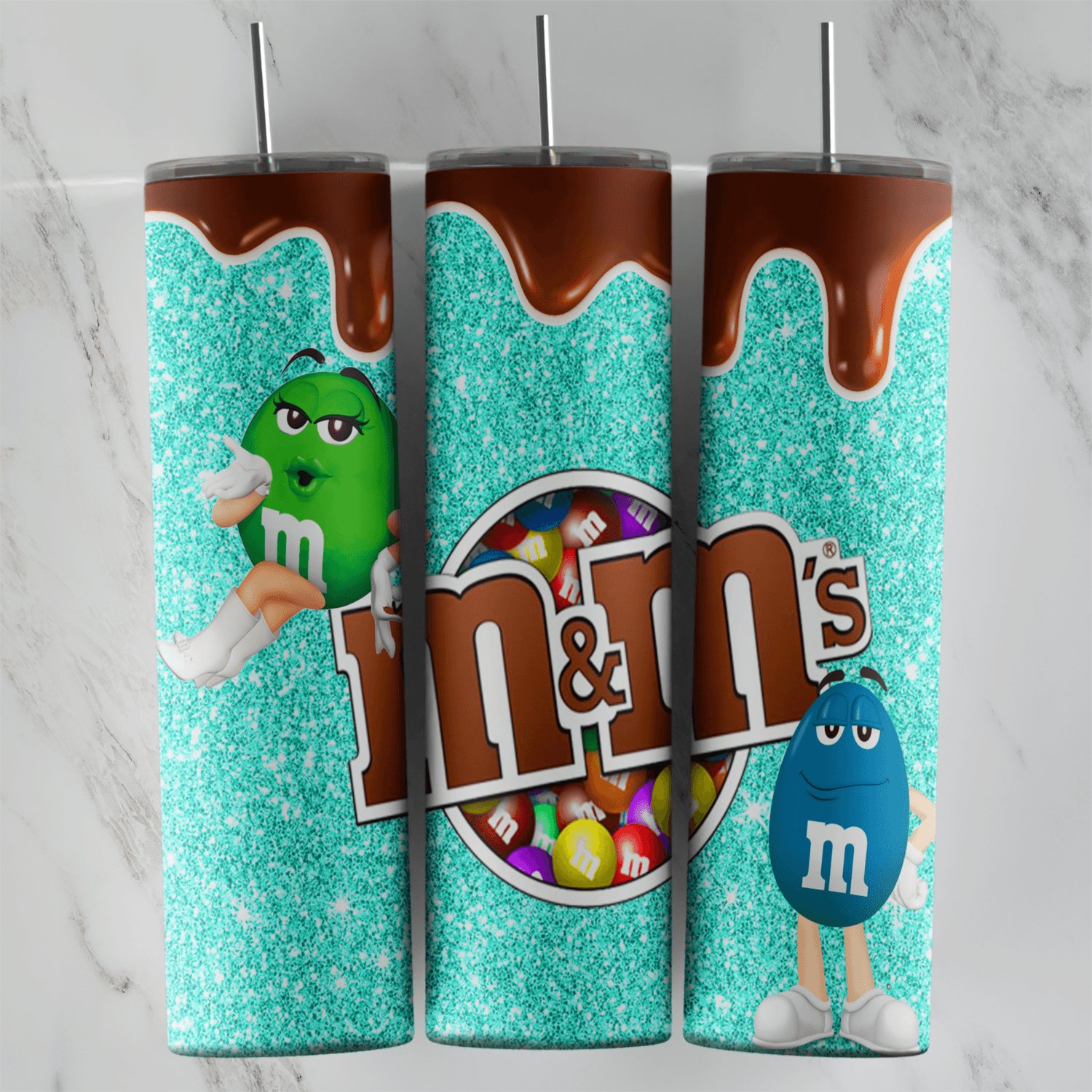 A teal glitter M and M tumbler wrap with a chocolate drip border, a large M and M’s logo full of candies, and the green and blue. Sublimation design