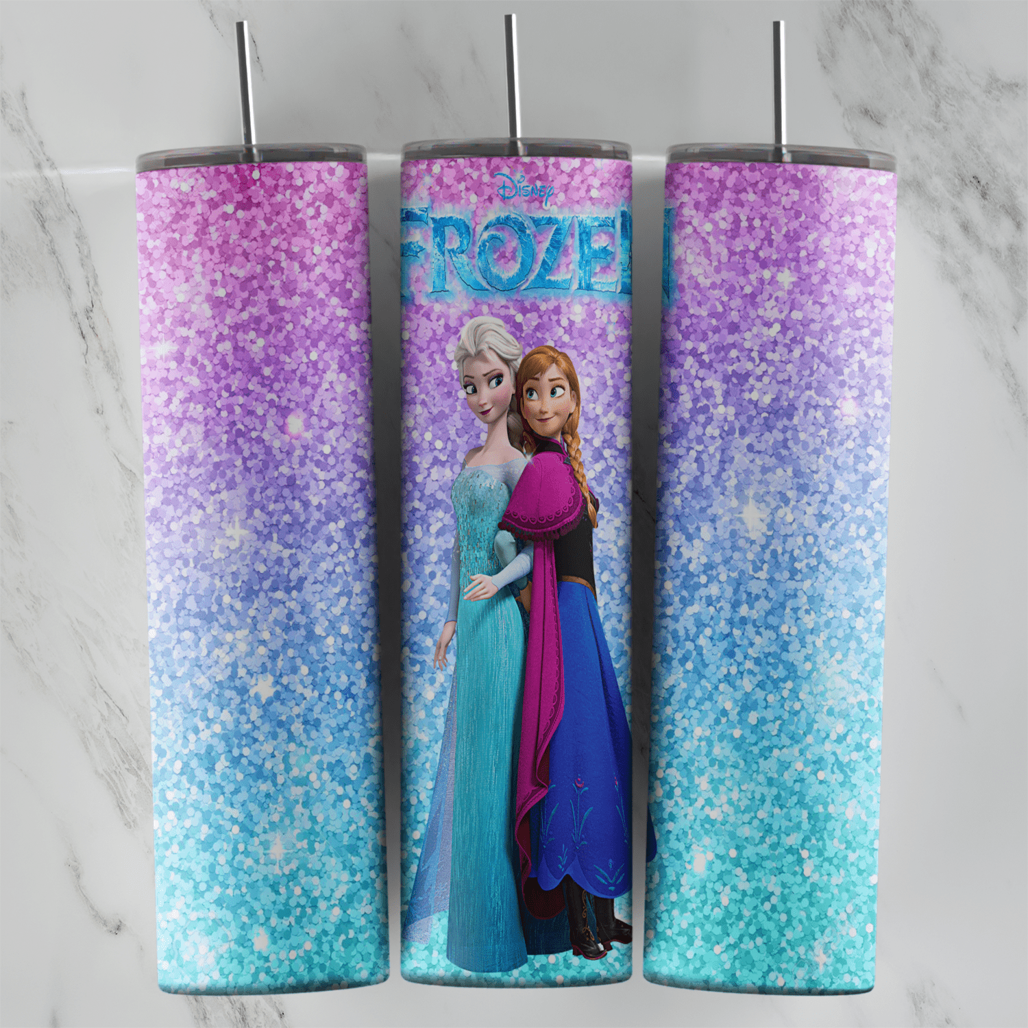 A 20 oz skinny tumbler wrap in purple to teal glitter texture with the Frozen logo and Elsa and Anna standing together. Sublimation design