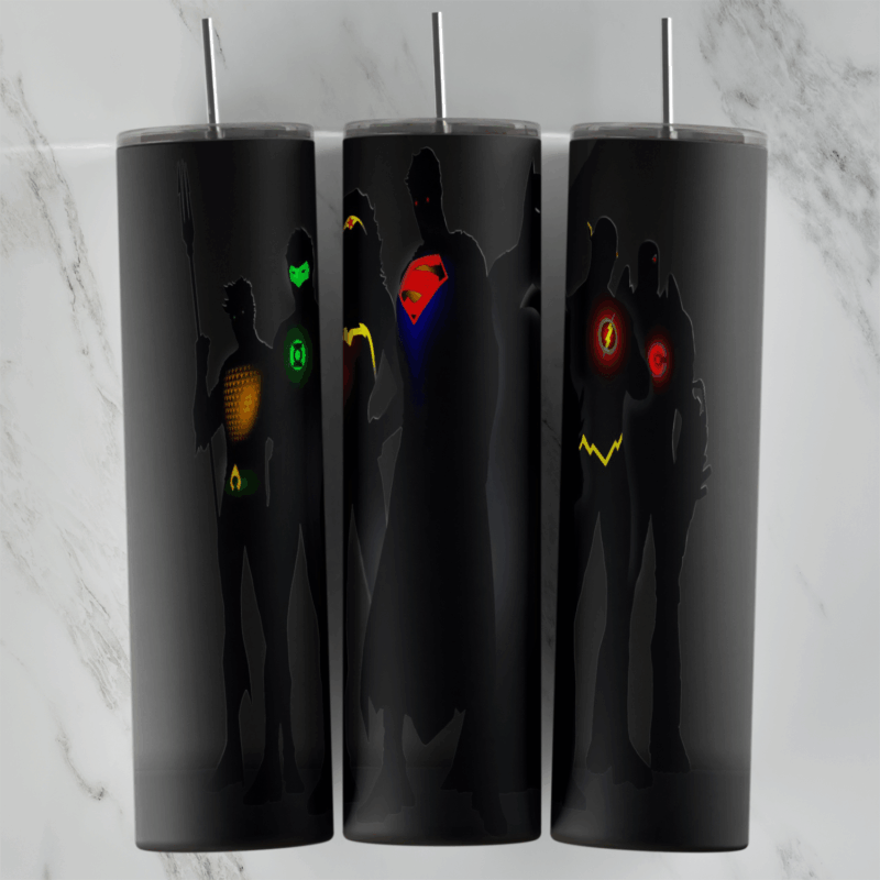 A 20 oz skinny tumbler wrap with dark hero silhouettes on black, lit only by their glowing emblems for Green Lantern, Superman. Sublimation design